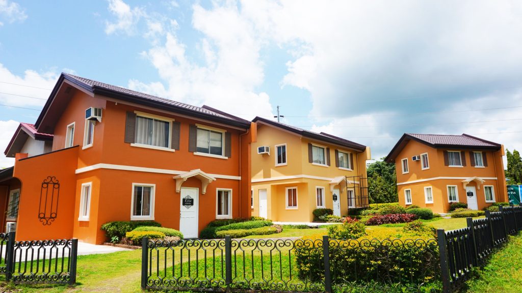 house with orange and yellow exterior paint