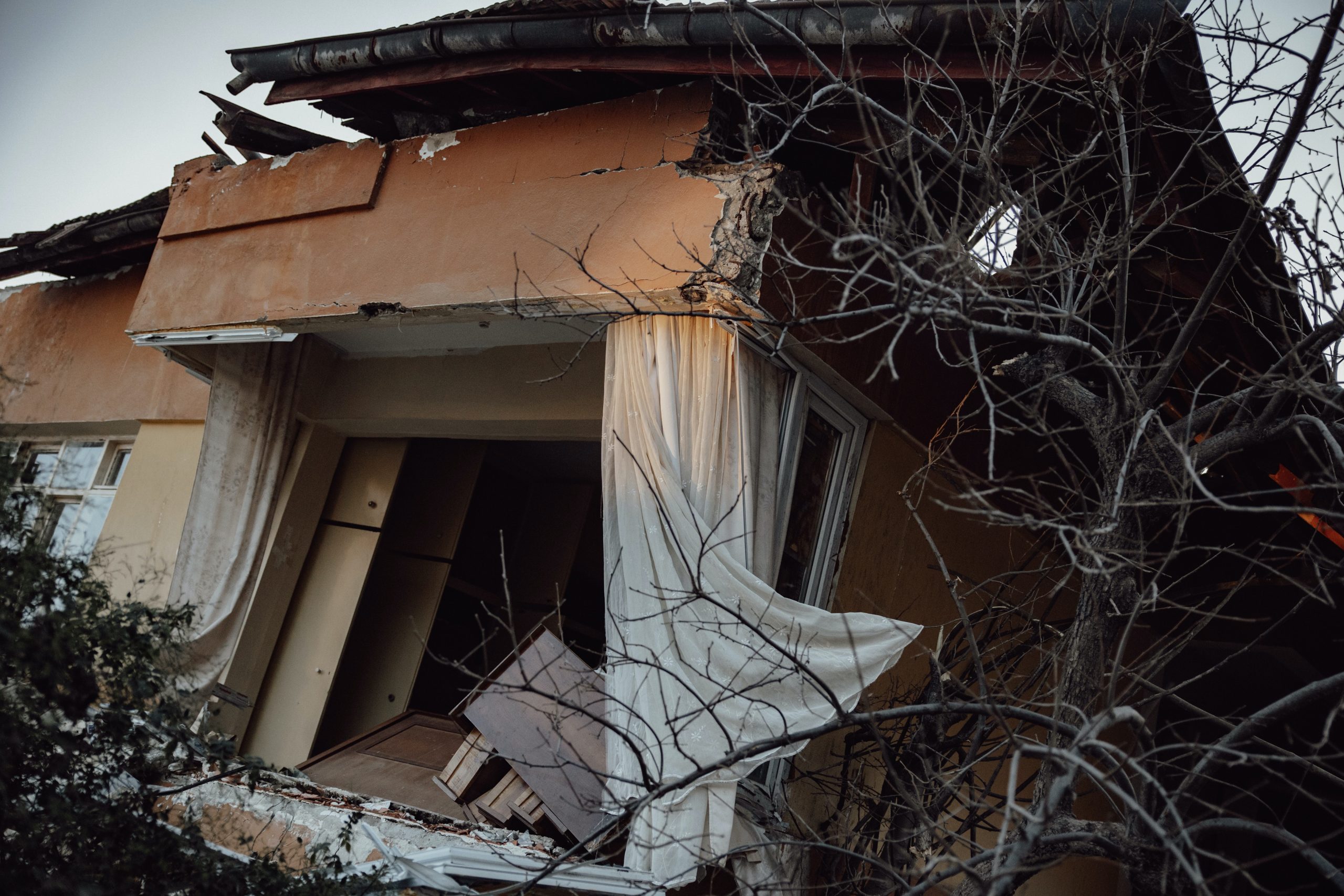 house devastated by an earthquake