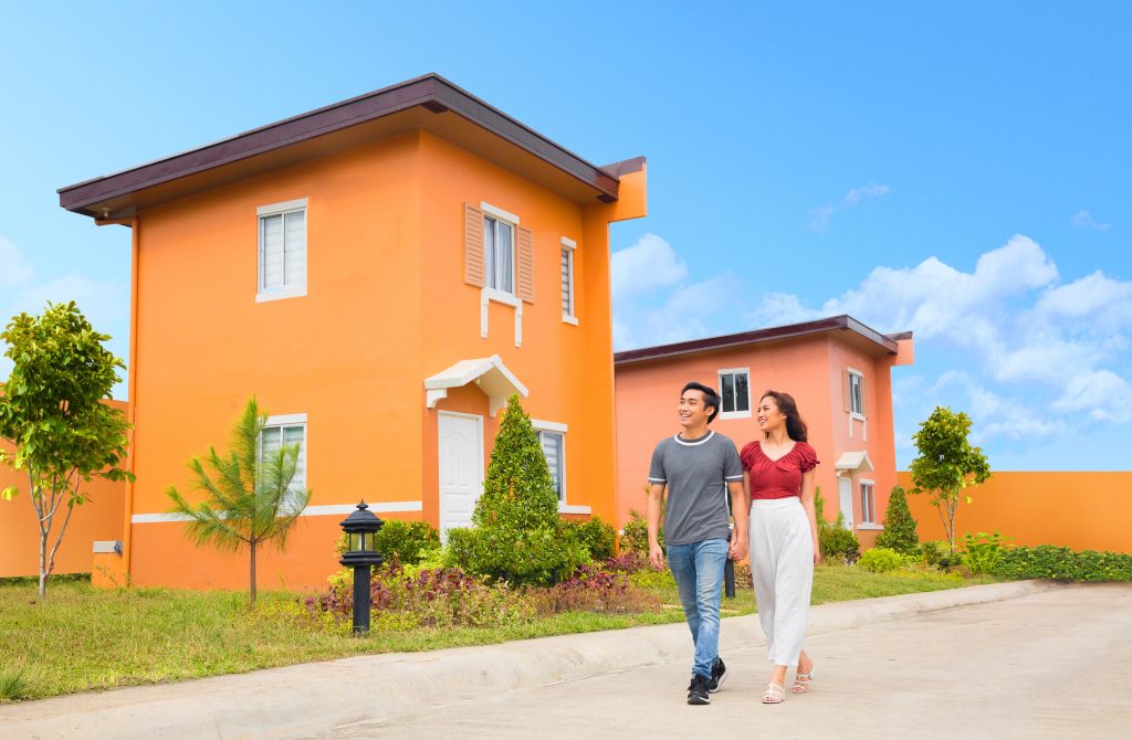 couple walking in their camella community