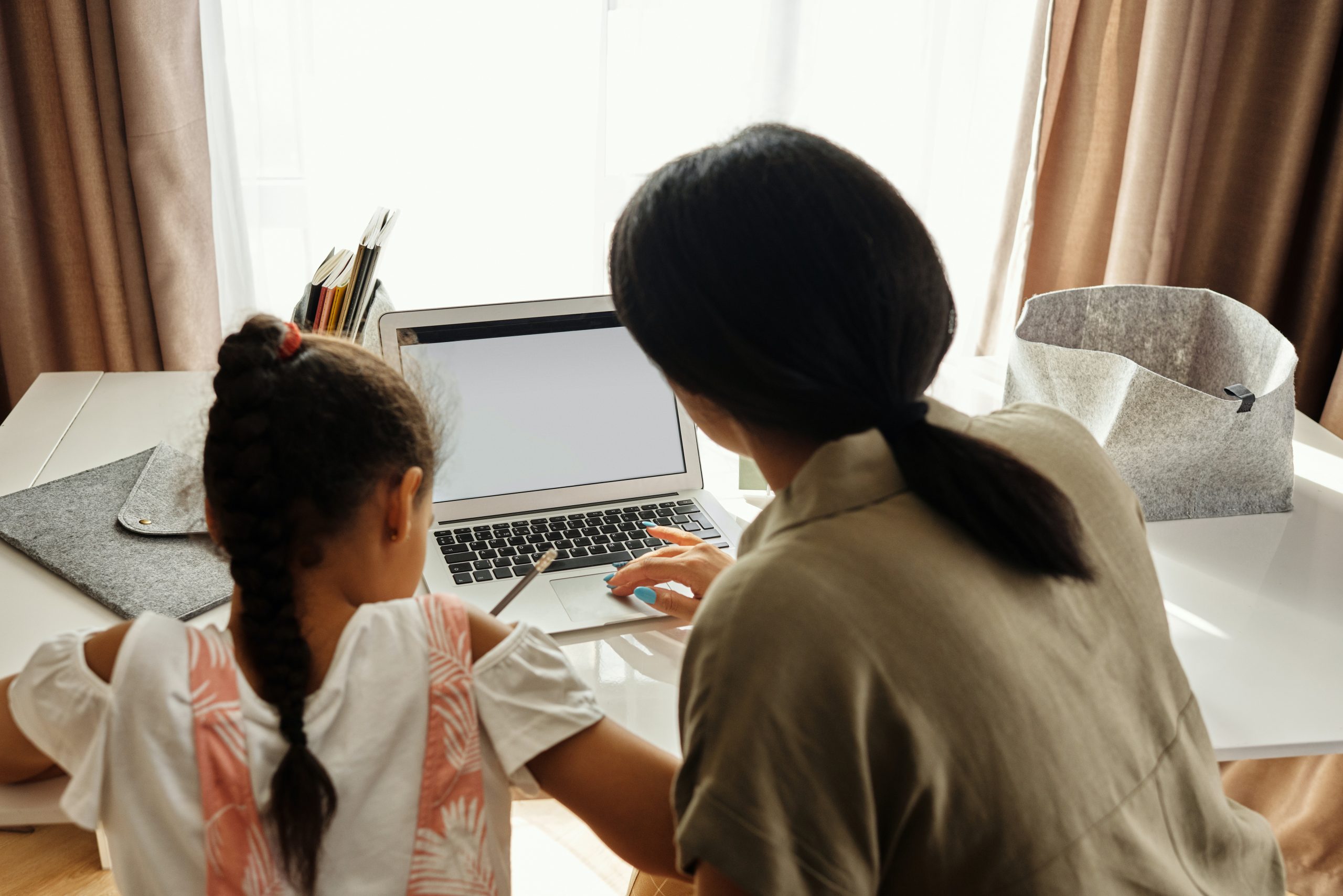 mother teaching daughter